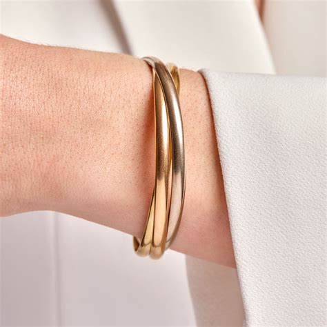 cartier trinity bracelet on hand